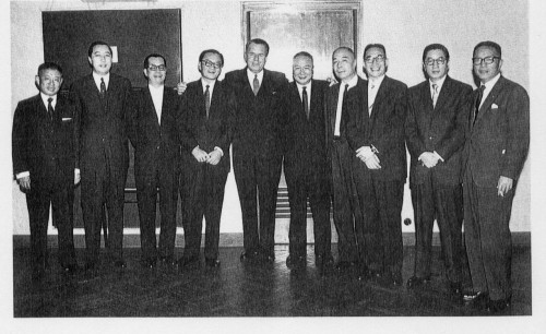 Shanghai spinners in the mid 1950s with the Chairman of the HSBC From left: Mr. Vincent Woo (Central Textiles), Mr. H. C. Yung (???, Nanyang), Mr. C. S. Loh (???, Wyler), Mr. T. Y. Wong (???, Hong Kong Spinners), Sir Michael Turner, Mr. C. C. Lee (???, South China), Mr. Mou Lee (??, Kowloon), Mr. Y. C. Wang (???, Nanyang), Mr. Z. D. Woo (???, Hong Kong Spinners) and Mr. T. Y. Tung (???, South China). Source: 40 Years of the Hong Kong Spinning Industry, p. 58.